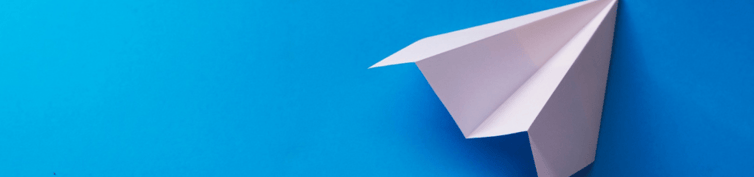 blue paper airplane top image