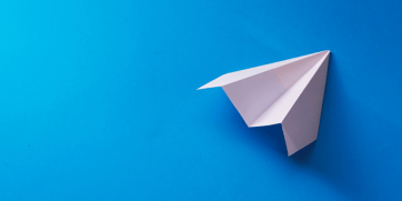 Blue paper airplane featured image