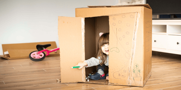 KiwiSaver Playing In Cardboard Box