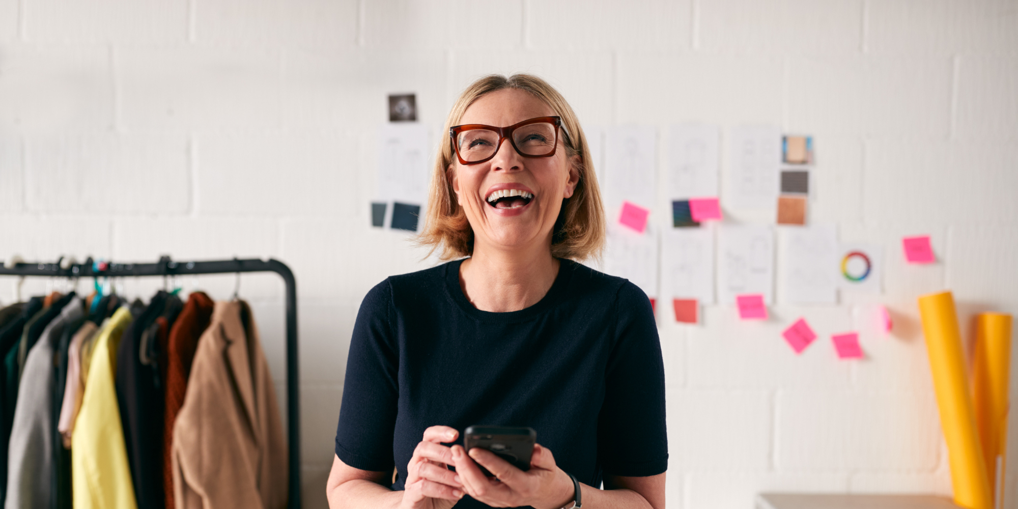 Woman laughing on phone (1)
