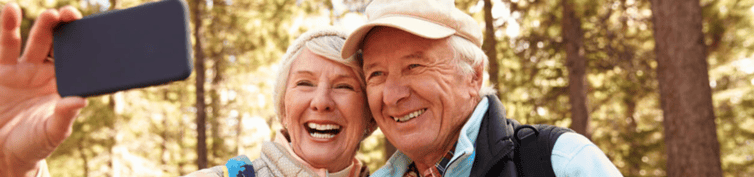retired couple hiking top banner