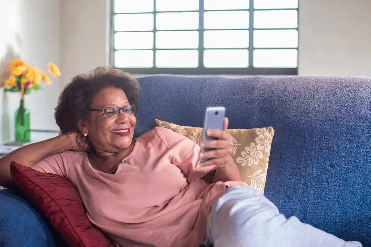secondary_18_elderly_lady_smiling_phone_0821